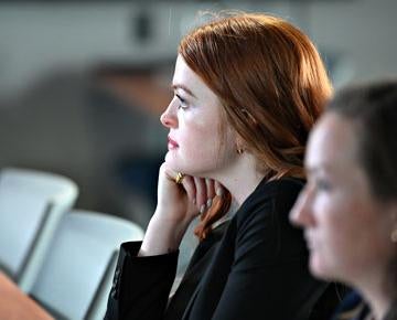 Law students listen intently during a class. 